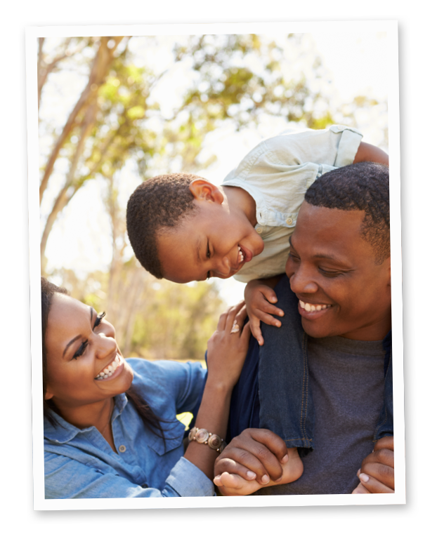 Photo of a family laughing