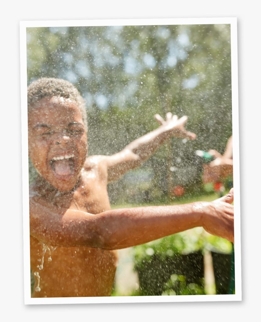 A boy playing with water