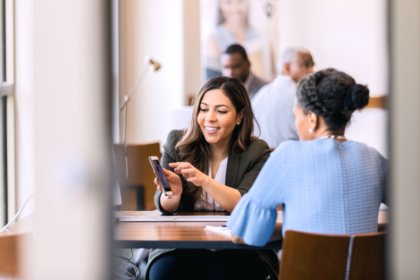 A financial advisor discusses trustee options after a bank merger and acquisition announcement.